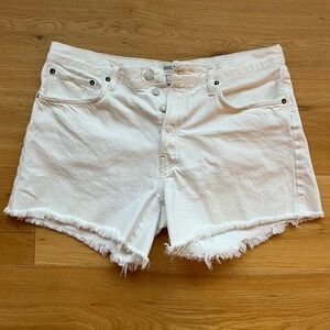AGolde Parker “long” distressed white denim shorts 31